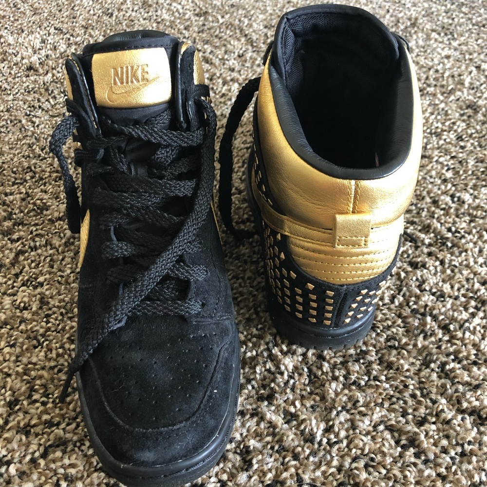 Black and Gold Nike sneakers